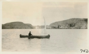 Image of MacMillan in canoe